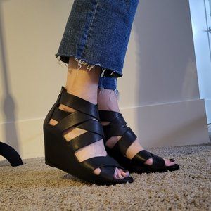 black wedge cross strap heels